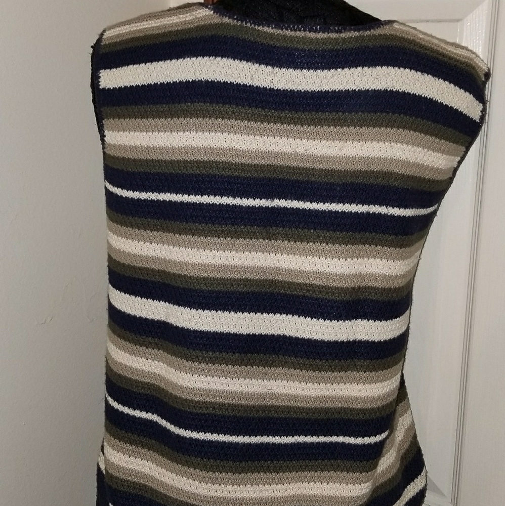 Previously loved sleeveless sweater vest